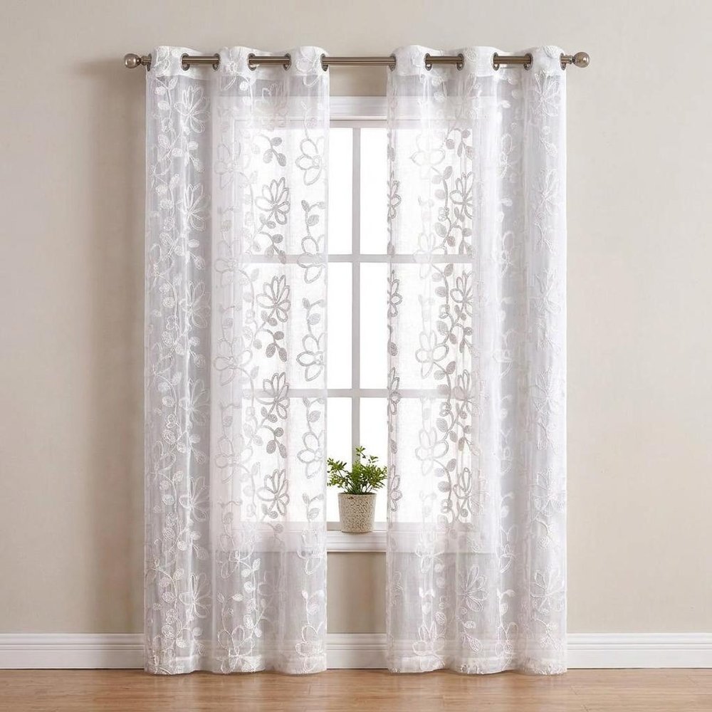 Set of Two 96" White Floral Embroidered Window Panels on a white background