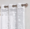Set of Two 96" White Floral Embroidered Window Panels on a white background