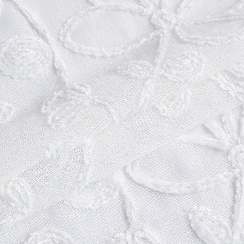 Set of Two 96" White Floral Embroidered Window Panels on a white background