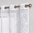 Set of Two 84" White Boho Embroidered Window Panels on a white background