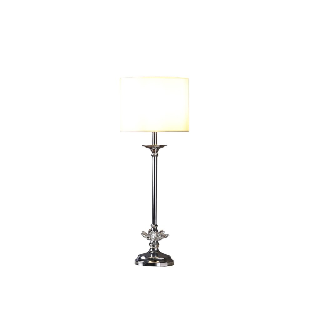 26" Silver Metal And Faux Crystal Table Lamp With White Cylinder Shade. Table lamp isolated on a plain white background, finished in silver crystal.