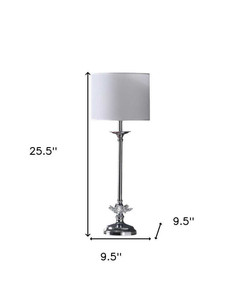 26" Silver Metal And Faux Crystal Table Lamp With White Cylinder Shade. Table lamp isolated on a plain white background, showing a silver crystal surface.