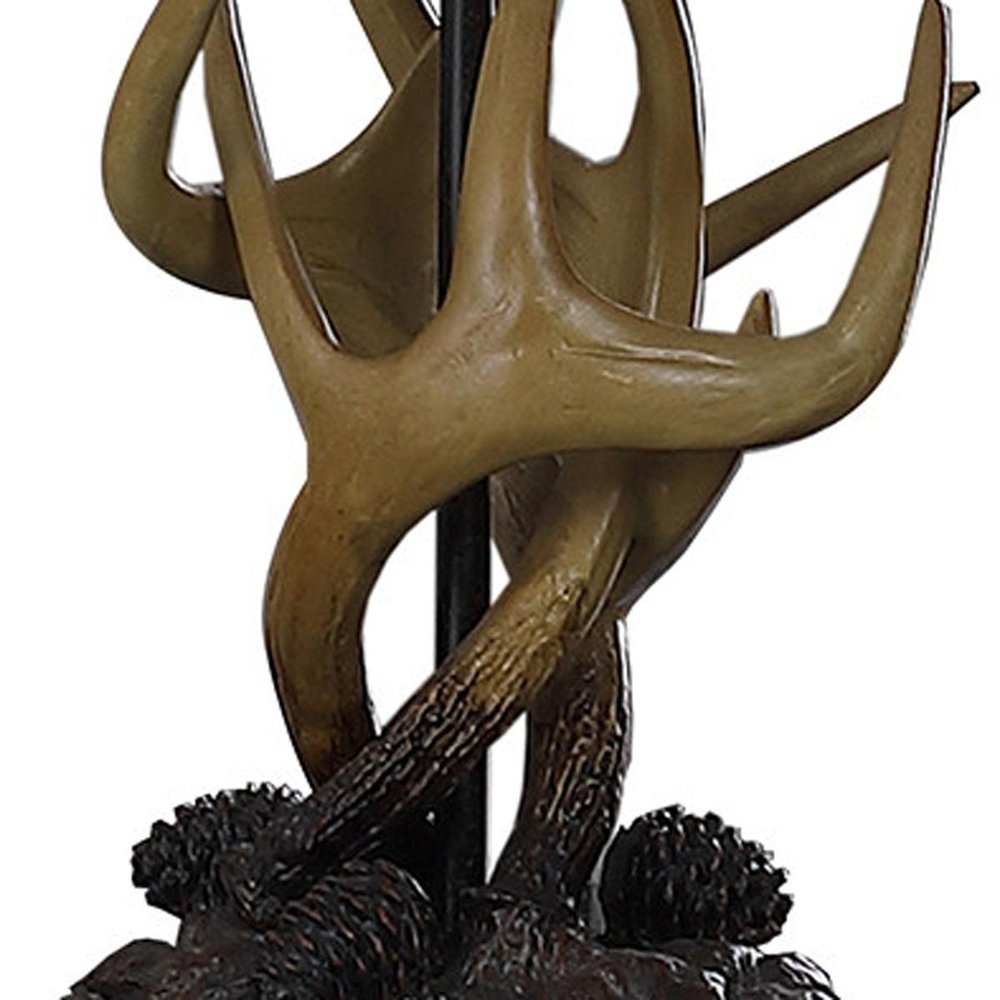 26" Natural And Brown Antlers Table Lamp With White Shade. Table lamp isolated on a plain white background, finished in brown.