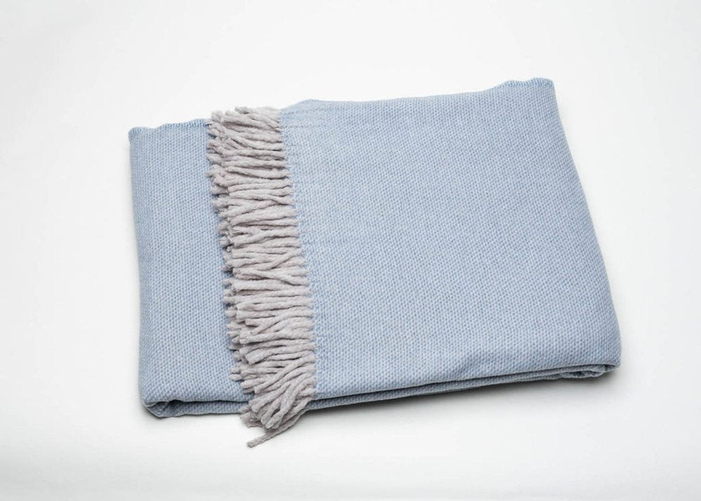 Sky Blue Mini Dot Fringed Throw Blanket on a white background