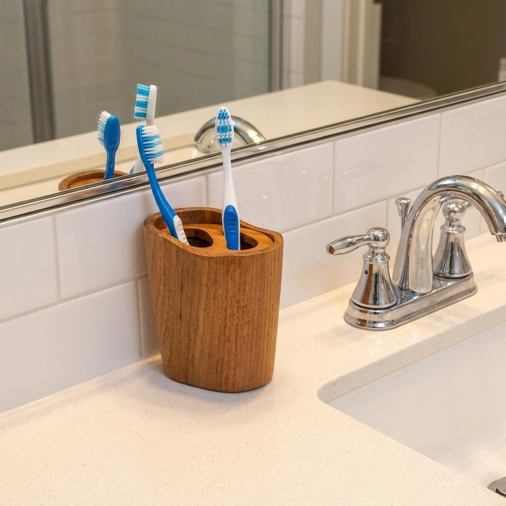 Natural Brown Solid Teak Oval Toothbrush Holder in a home interior
