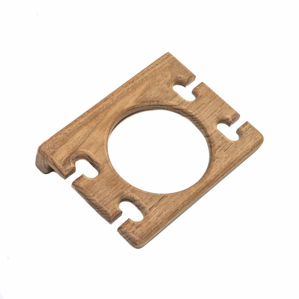 Wooden wall mount cup and toothbrush holder with a circular opening and four slots, on a white background.