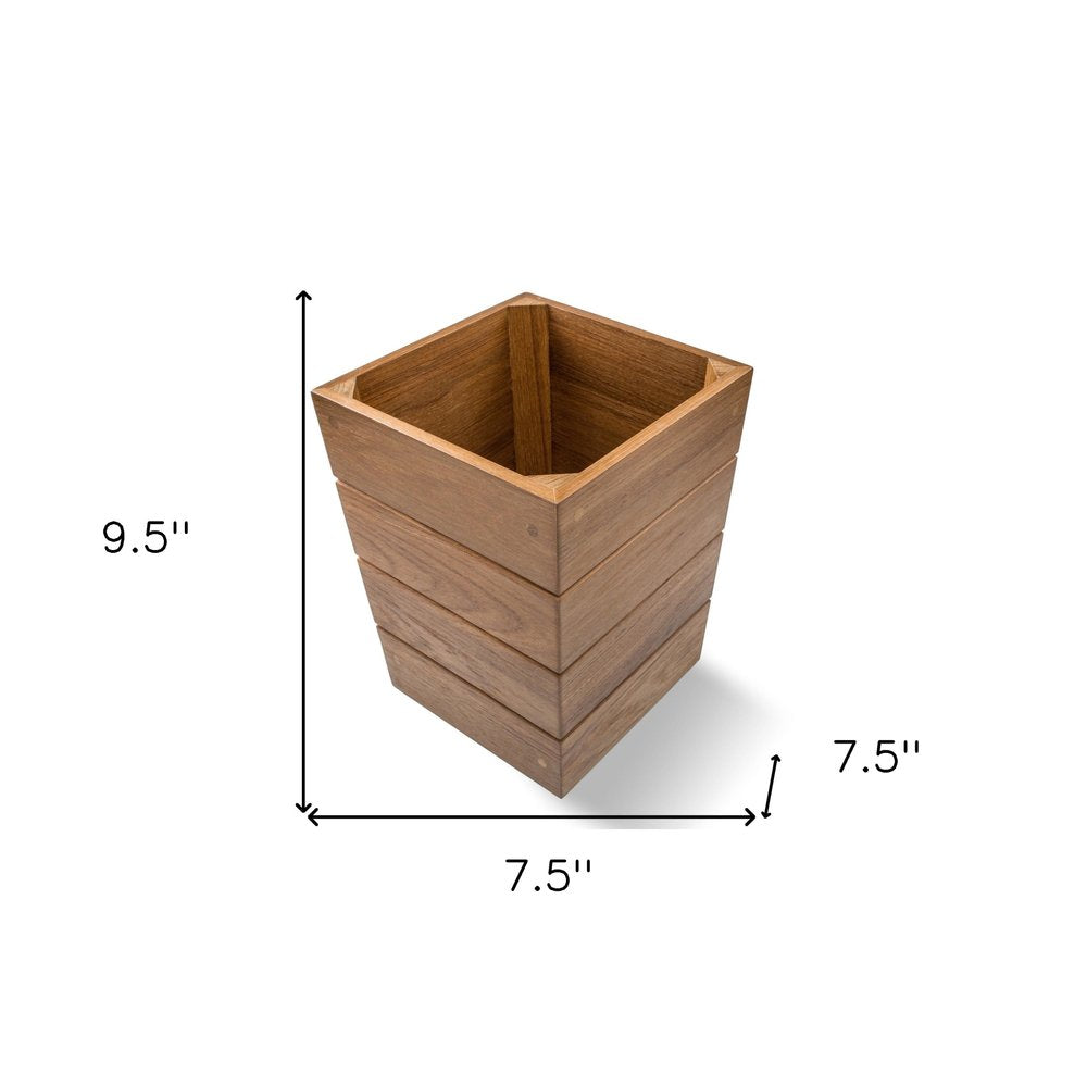 10" Traditional Solid Teak Small Waste Basket. Bath accessorie isolated on a plain white background, in a brown teak finish.