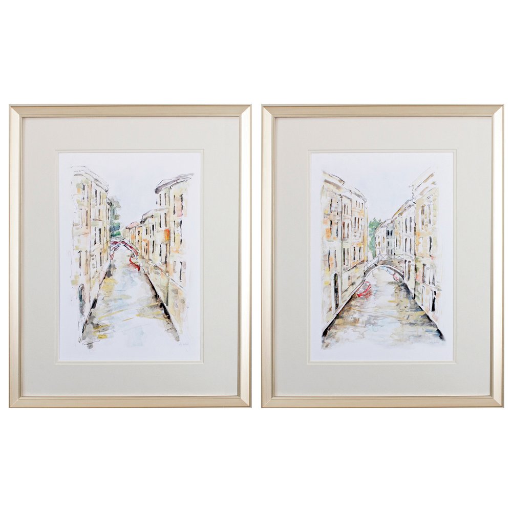 Set of two framed watercolor paintings of Venetian canals with buildings and bridges, in gold frames.