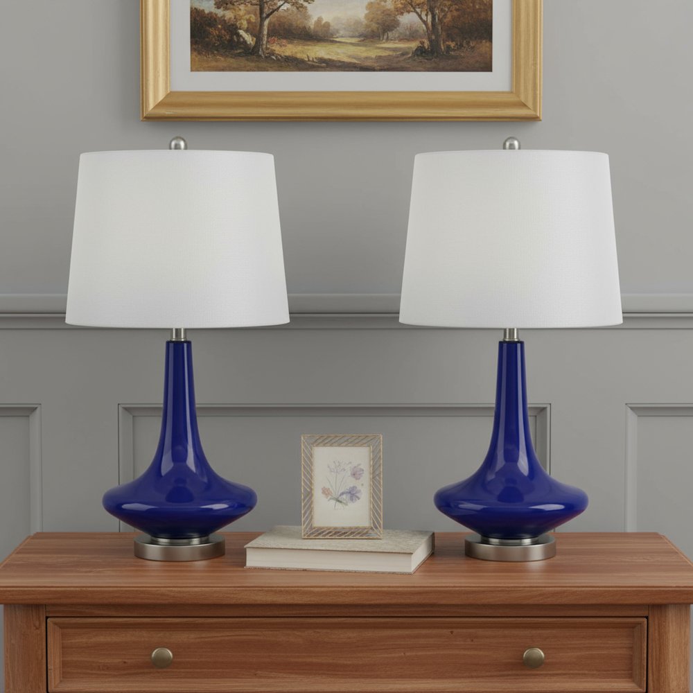 Set Of Two 26" Silver Metal Two Light Bedside Table Lamps With White Globe Shade in a home interior