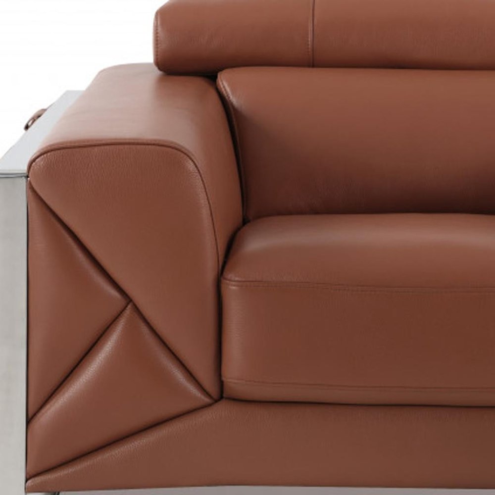 48" Camel And Silver Italian Leather Arm Chair - 35" H x 48" W x 43" D. Accent chair in camel leather.