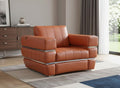48" White Italian Leather Arm Chair styled in a furnished interior on a tiled floor against a light gray wall.
