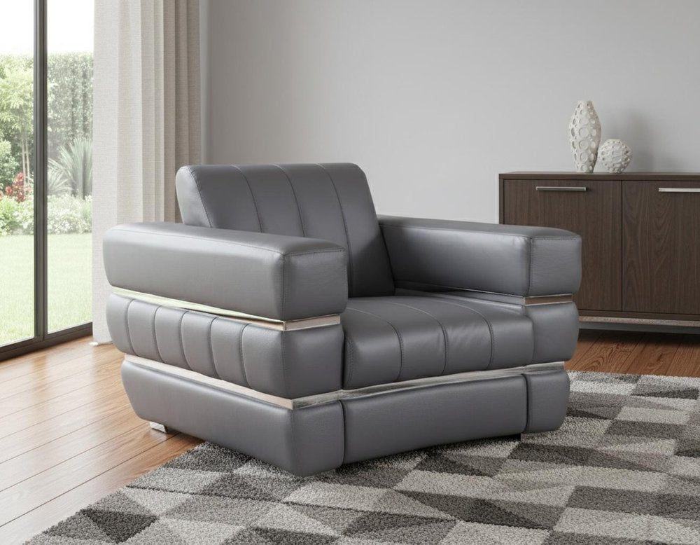 48" White Italian Leather Arm Chair styled in a furnished interior on a tiled floor against a light gray wall.