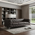 93" White Italian Leather Chesterfield Sofa With Silver Legs in a home interior