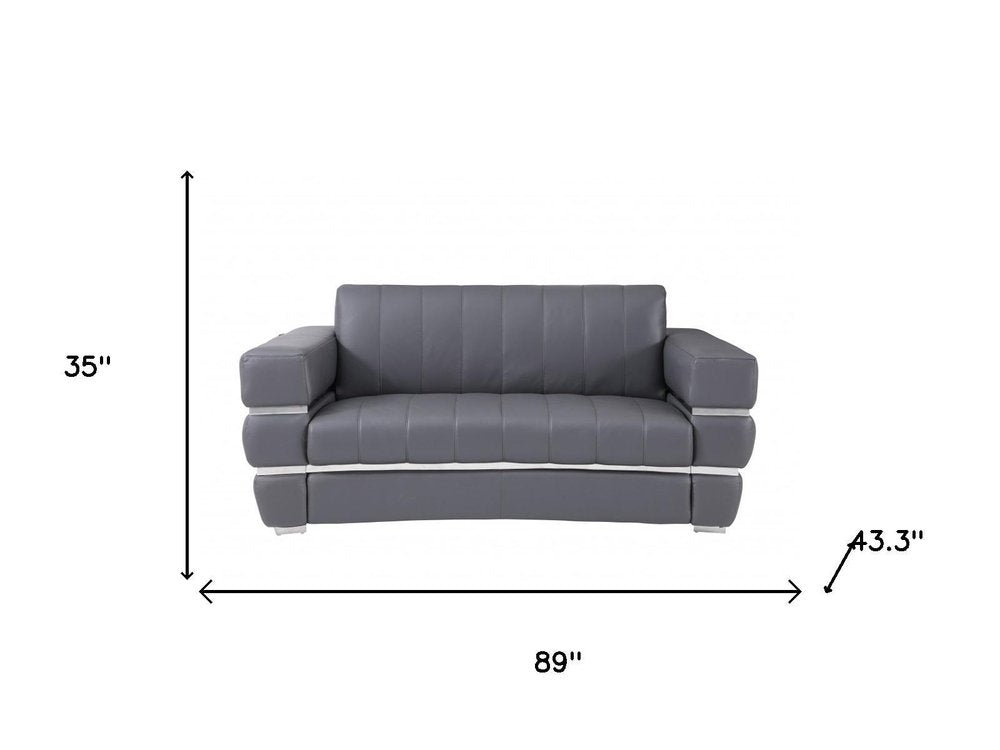 Two Piece Indoor Dark Gray Italian Leather Five Person Seating Set - 35" H x 89" W x 43.3" D on a white background