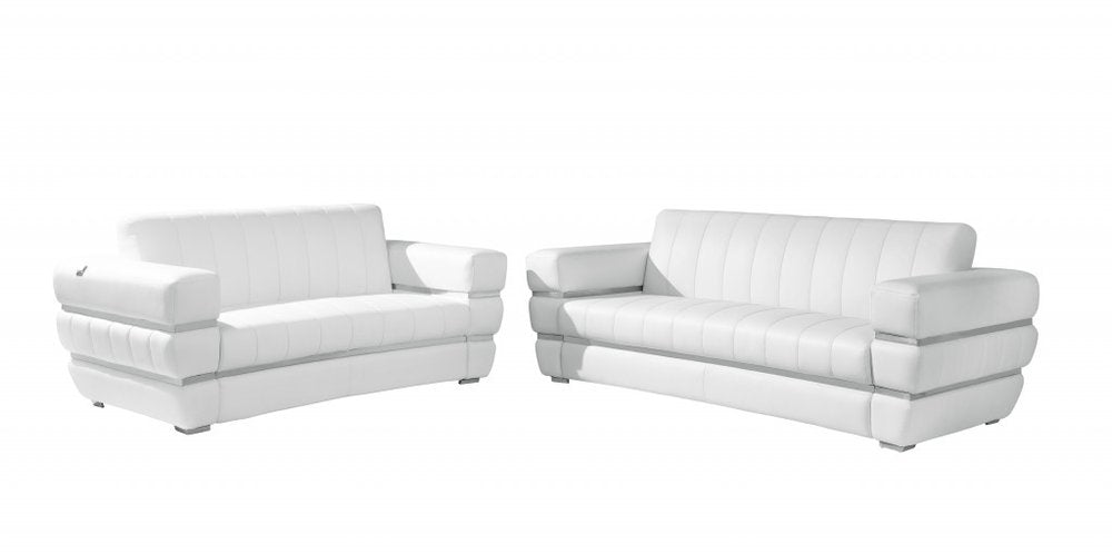 Two white Italian leather sofas on a white background.