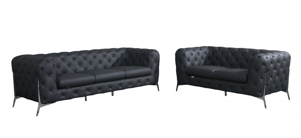 Two piece dark gray tufted Italian leather five person seating set on a white background.
