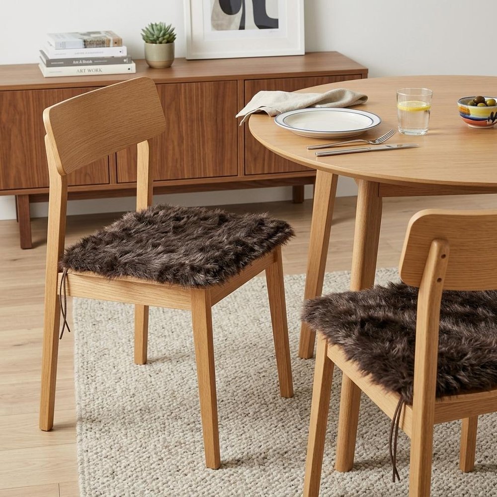 Set of Two 17" Chocolate Faux Fur Dining Chair Pads in a home interior