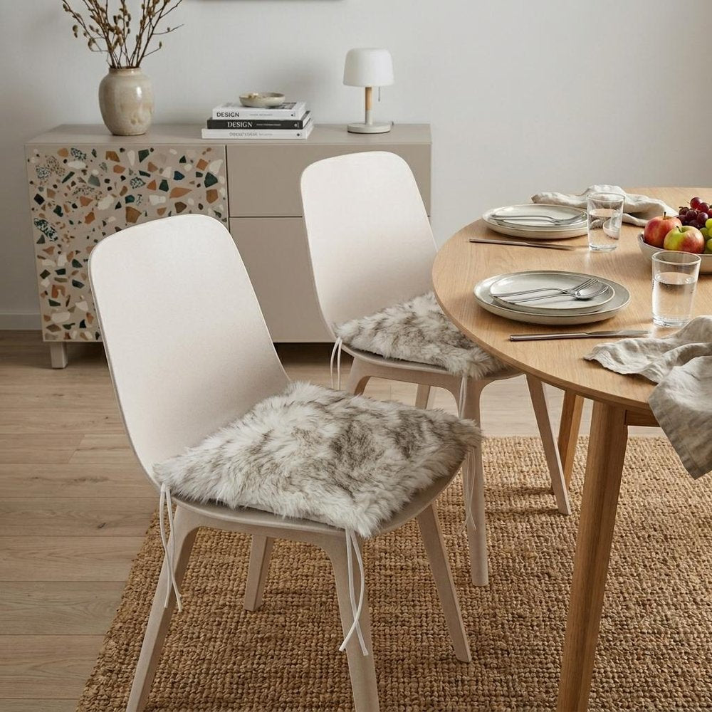 Set of Two 17" Ivory and Brown Faux Fur Dining Chair Pads in a home interior