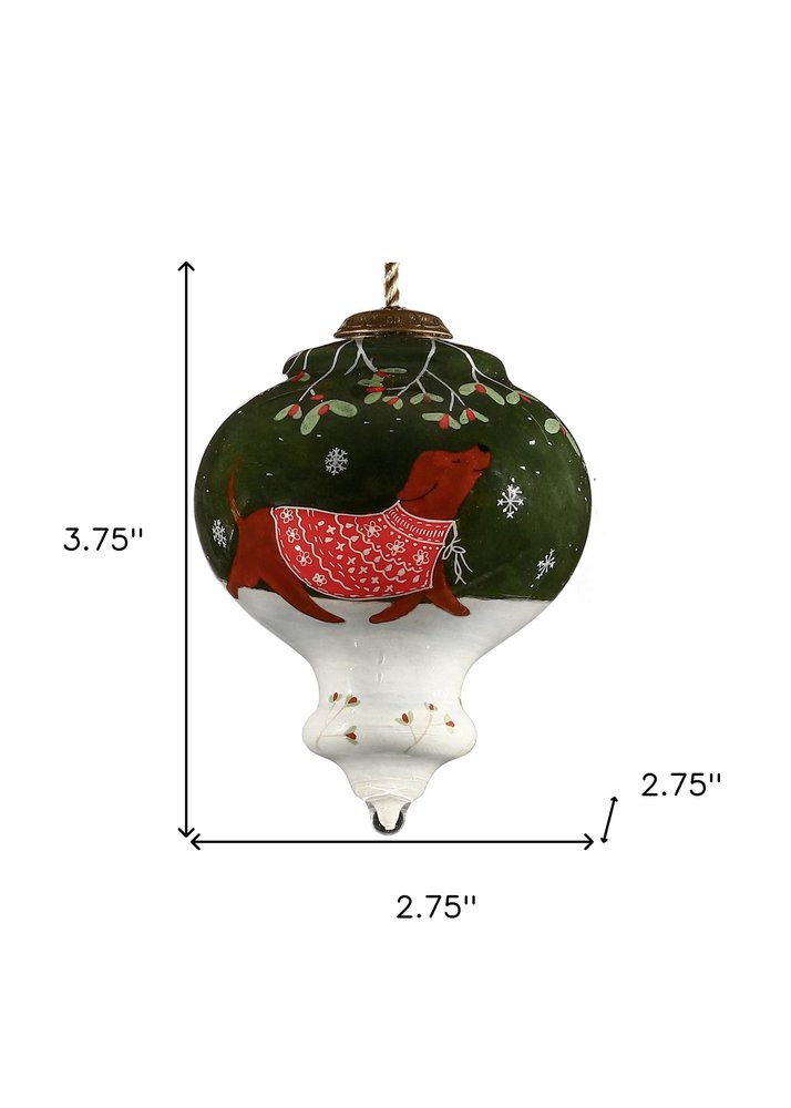 Trotting Dog in Comfy Christmas Attire Hand Painted Mouth Blown Glass Ornament on a white background