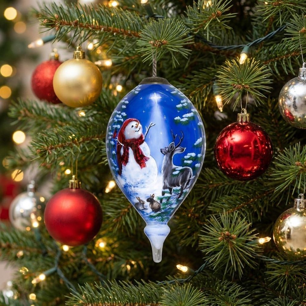 Starry Heaven and Snowman Hand Painted Mouth Blown Glass Ornament in a home interior