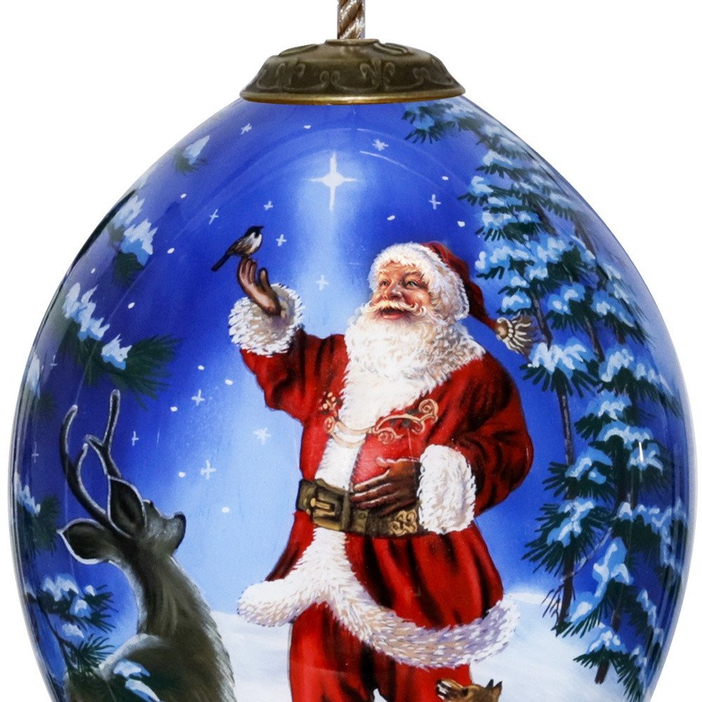 Starry Heaven and Santa Hand Painted Mouth Blown Glass Ornament on a white background