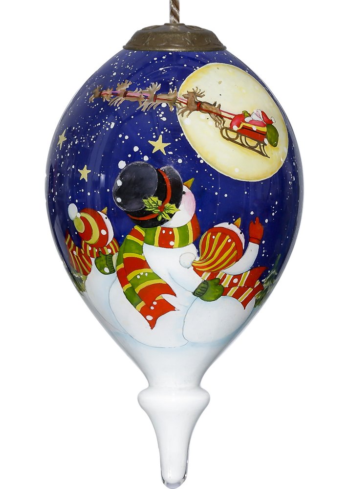 Snowmen Family Watching Santa on a Sleigh Hand Painted Mouth Blown Glass Ornament on a white background