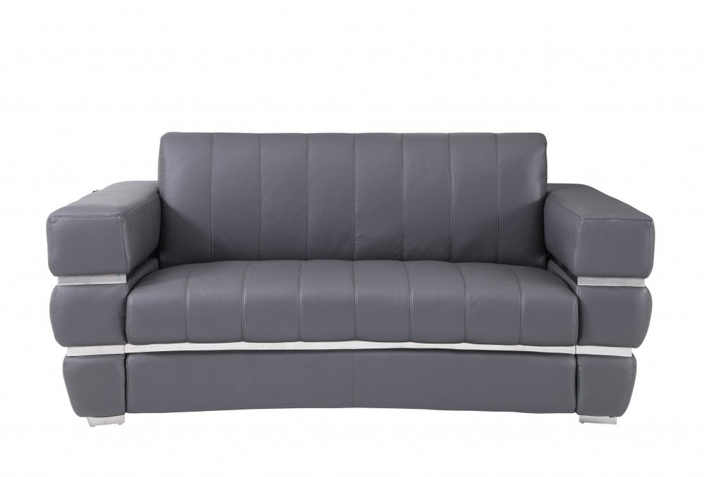 Gray Italian leather loveseat with silver accents on a white background.