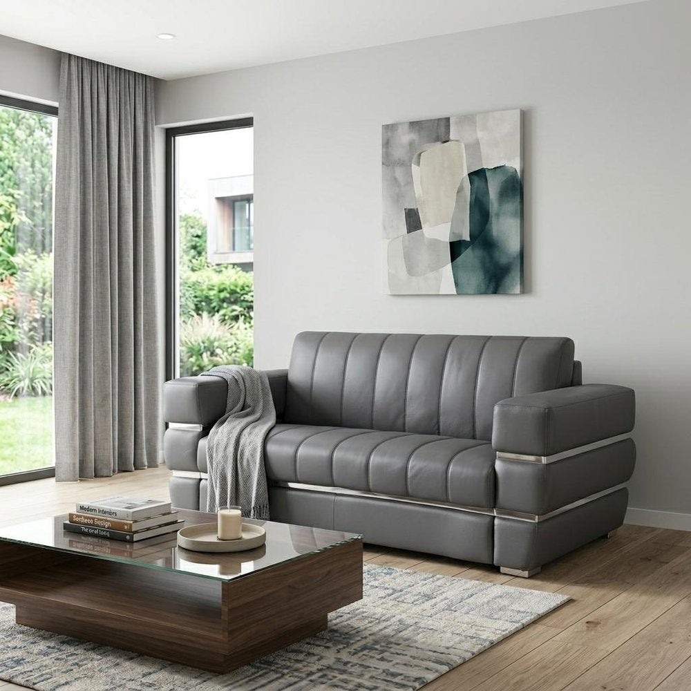 75" Gray And Silver Italian Leather Loveseat - 35" H x 75" W x 44" D in a home interior