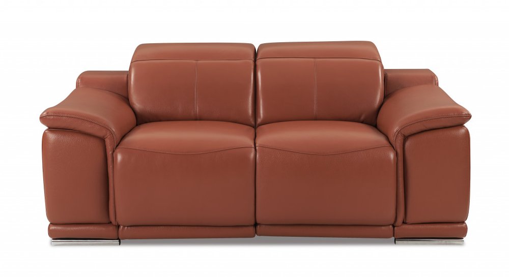 Front view of a camel-colored Italian leather loveseat with silver legs on a white background.