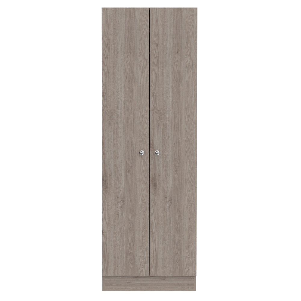 A tall, narrow light gray wood storage closet with two doors and silver knobs against a white background.
