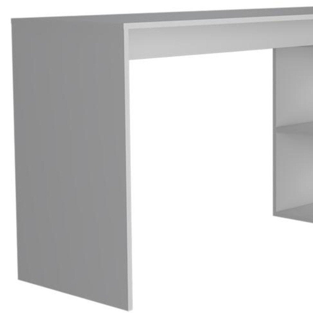 60" White L Shape Computer Desk. Desk isolated on a plain white background, in a white finish.