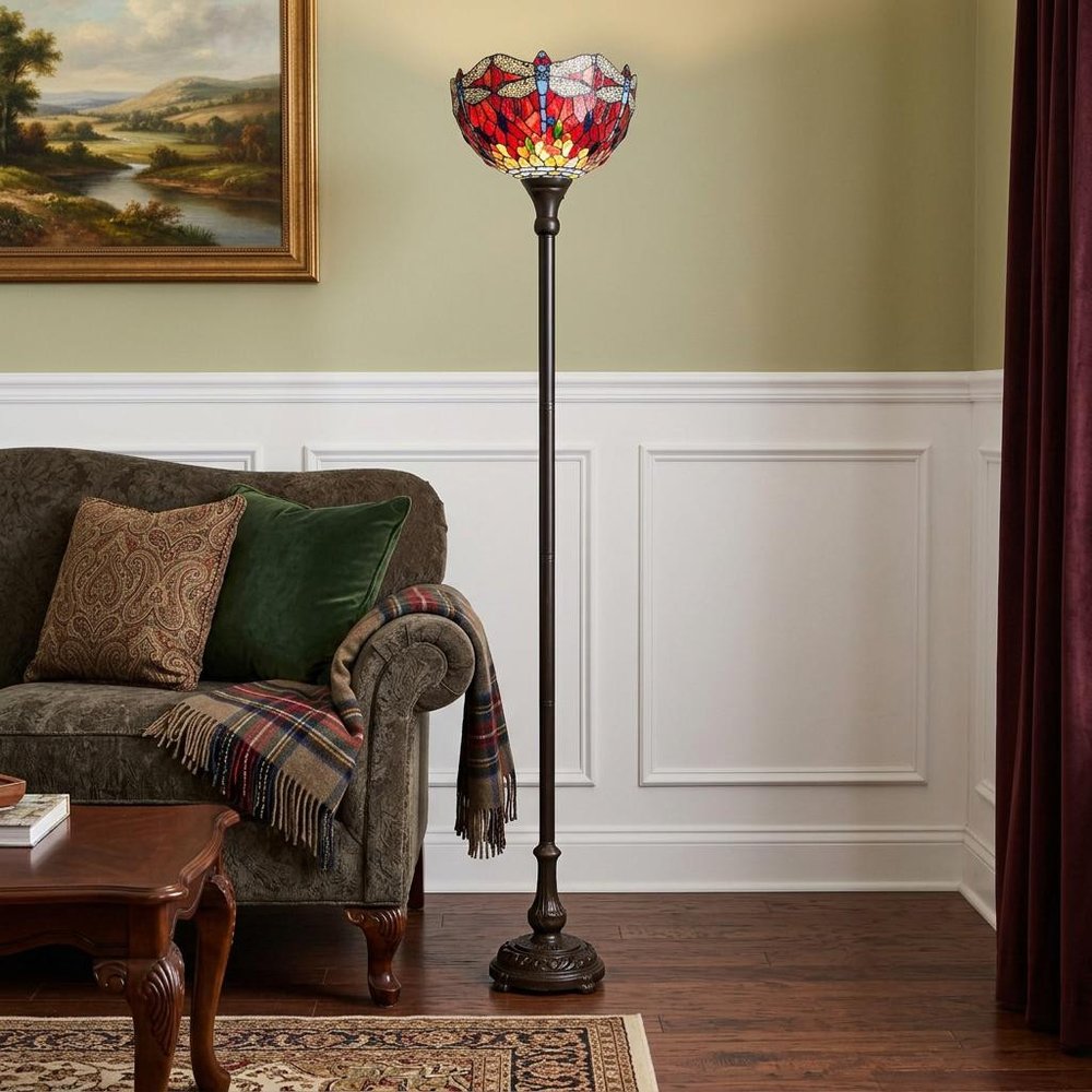 69" Black And Red Torchiere Floor Lamp With Red Dragonfly Glass Dome Shade standing in a furnished interior on a dark wood floor.
