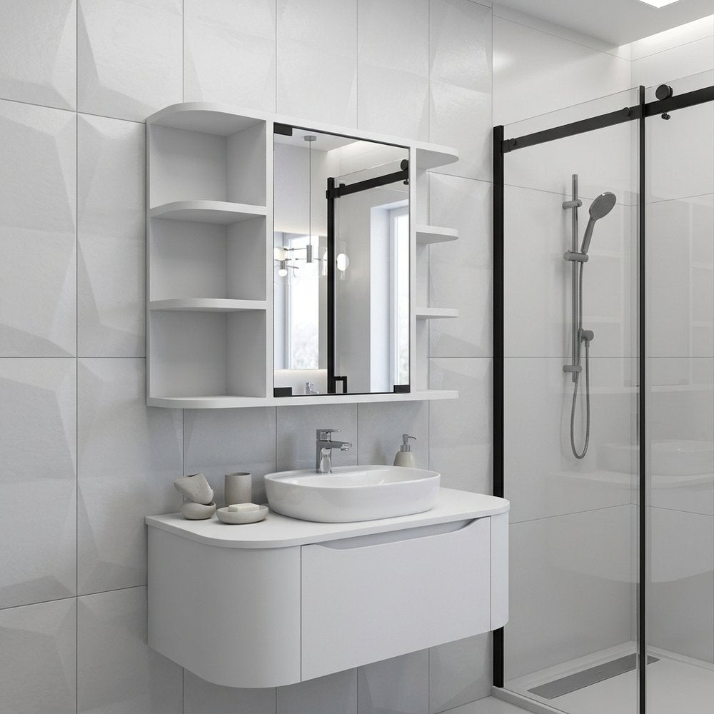 White wood floating bathroom vanity with medicine cabinet and mirror, set against a tiled wall with a shower enclosure.