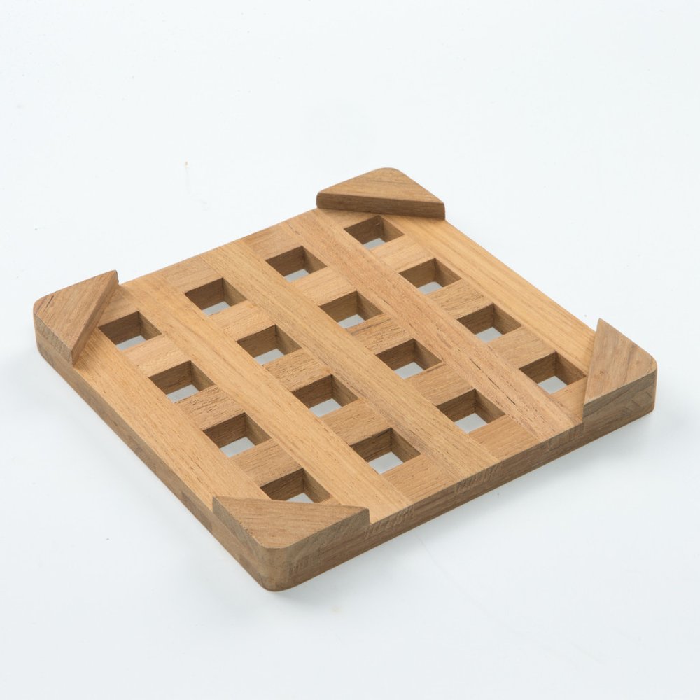 6.00 " Square Wood Trivet. Kitchen accessory isolated on a plain white background, showing a brown wood surface.