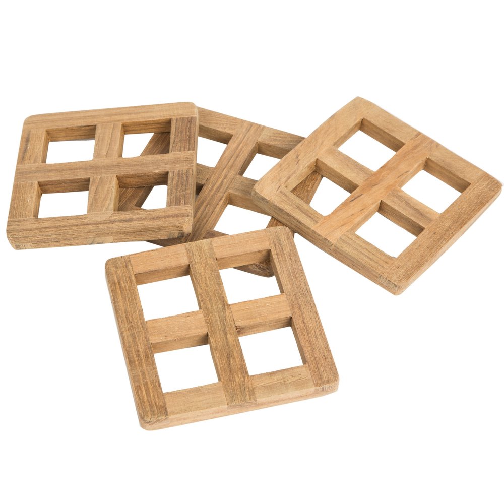Set of four square wooden coasters with a grid pattern, natural wood color, on a white background.