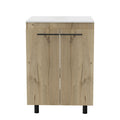 A 24-inch oak wood freestanding double door bathroom vanity with a white sink and black handles against a white background.
