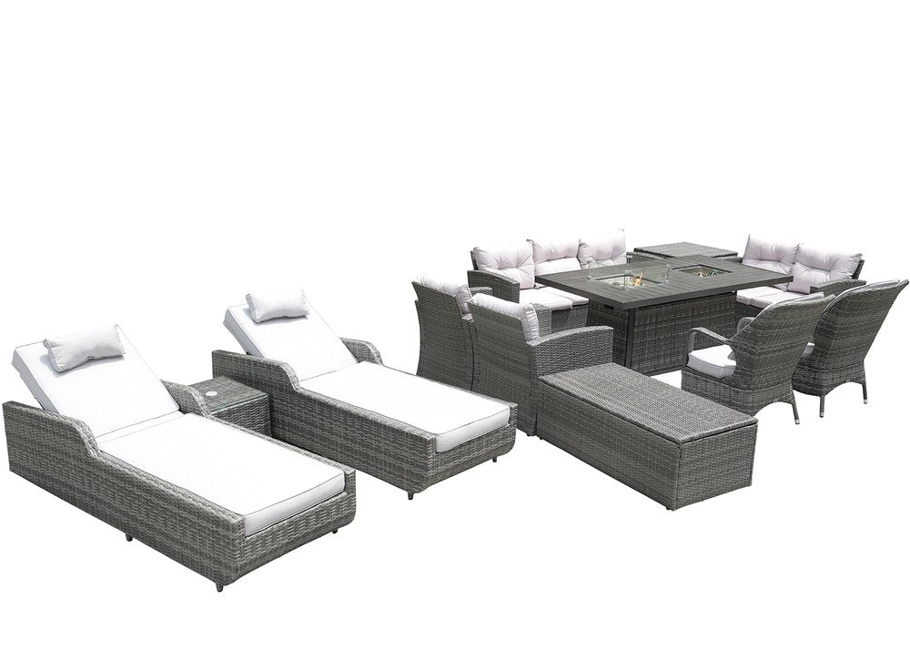 Gray wicker outdoor seating group with white cushions, including multiple chairs, chaise lounges, and a fire pit table.