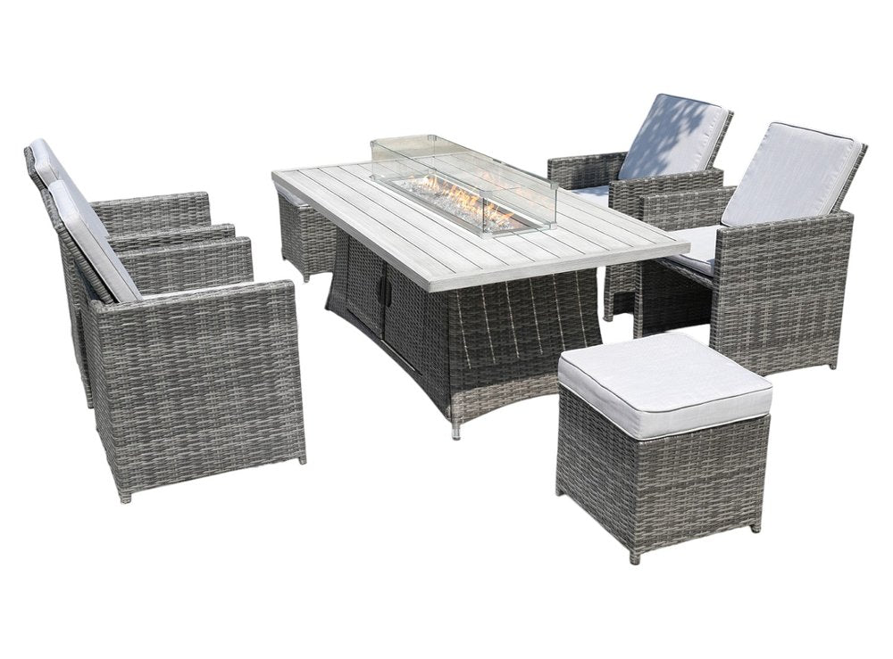 Gray wicker outdoor seating group with fire pit table and four chairs on a white background.