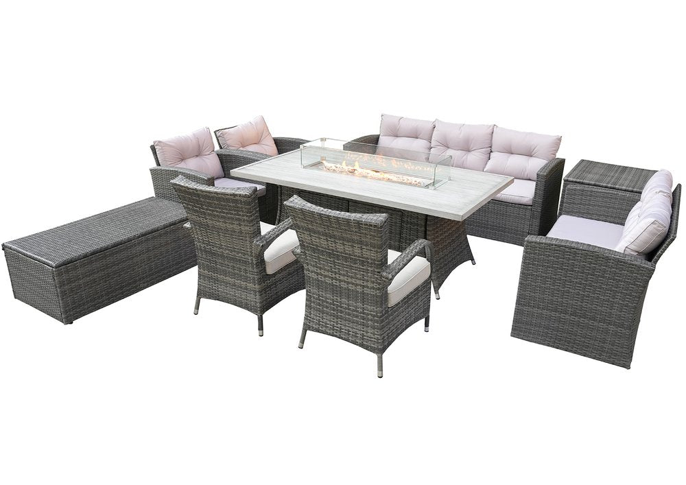 Gray wicker nine-piece outdoor seating group with fire pit table, sofa, chairs, and storage bench on a white background.