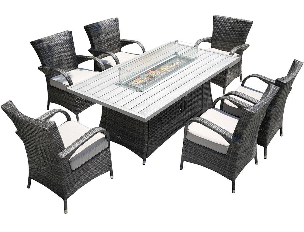 Gray wicker dining set with beige cushions and a rectangular fire pit table with a glass enclosure on a white background.