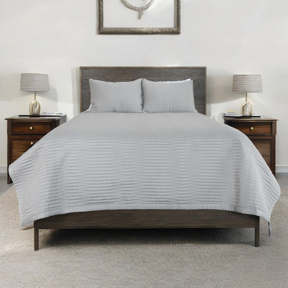 Set of Three Gray Geometric King Quilt in a home interior