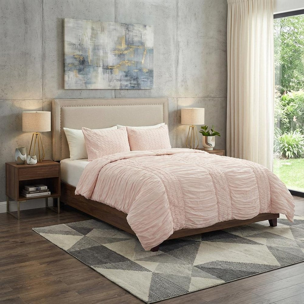 Pink Geometric King Quilt in a home interior