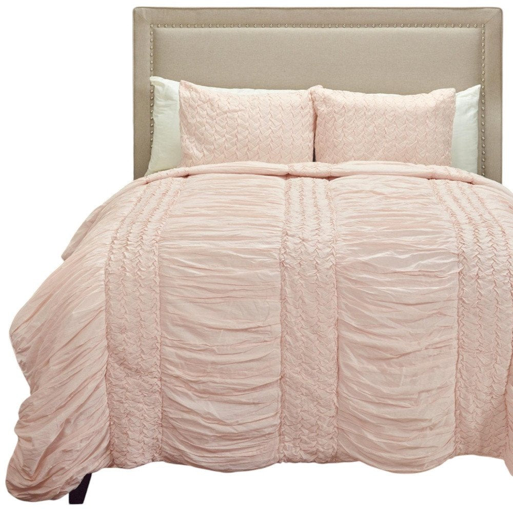 Pink Geometric Twin Quilt on a white background