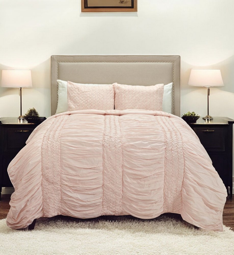 Pink Geometric Twin Quilt on a white background