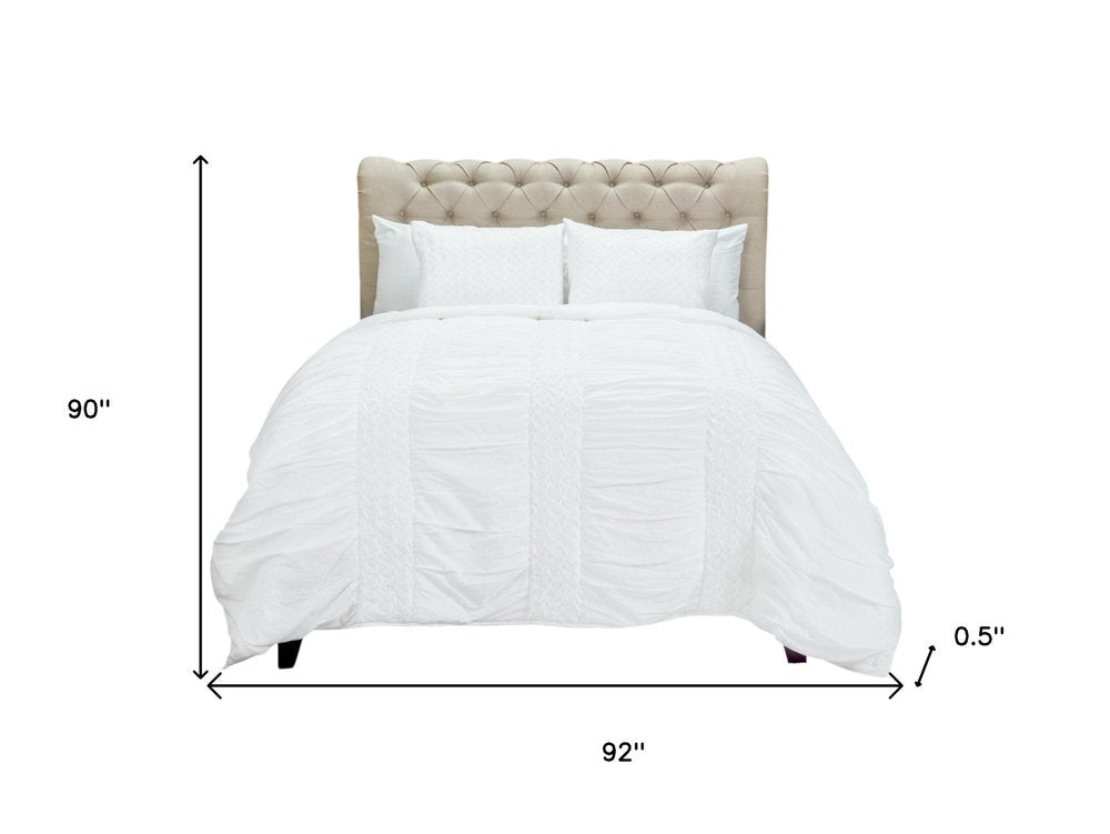 White Geometric Queen Quilt on a white background