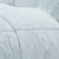 White Geometric Queen Quilt on a white background