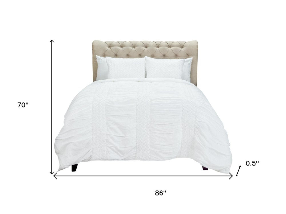 White Geometric Twin Quilt on a white background