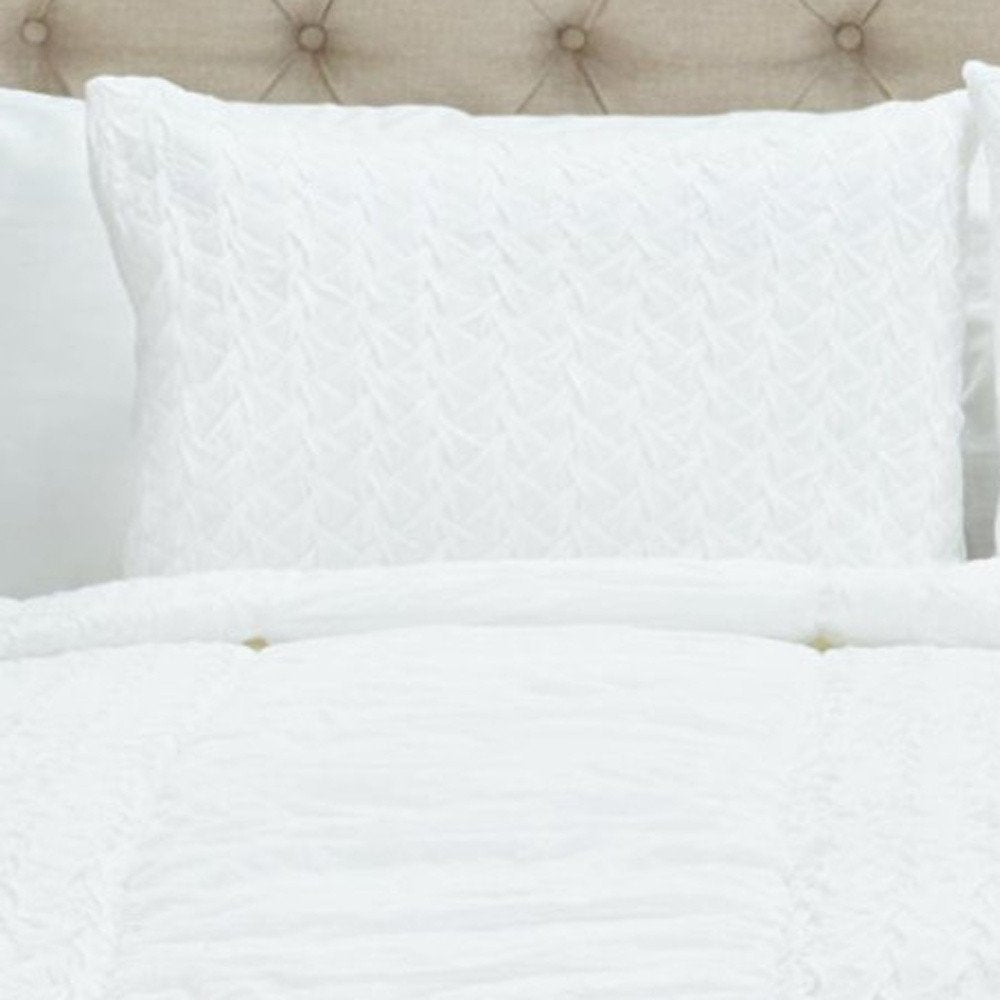 White Geometric Twin Quilt on a white background
