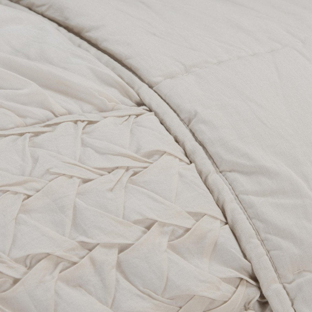 Ivory Geometric King Quilt on a white background