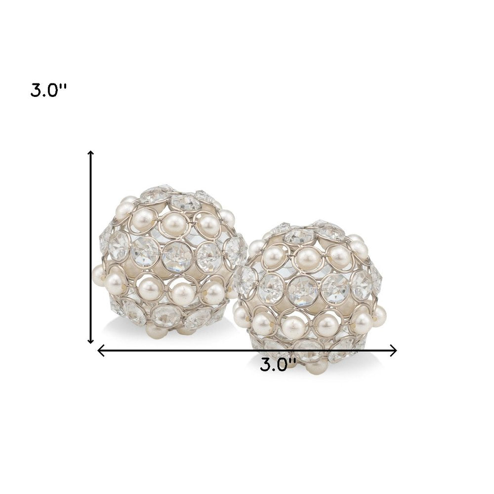 Set of Two Silver and Clear Faux Crystal and Pearl Decorative Orbs on a white background